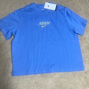Nike Kids Short Sleeve Tee in Light Blue with Yellow Swoosh